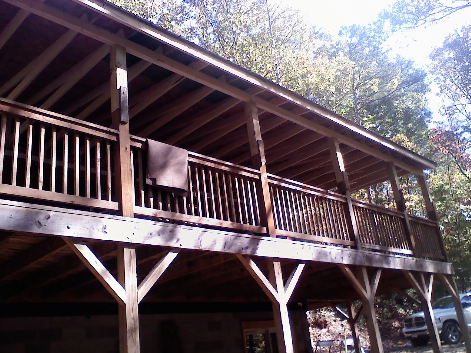 Timber framing under a new elevated porch and deck — Roof Leak Repair in Sims by Roofing Brothers